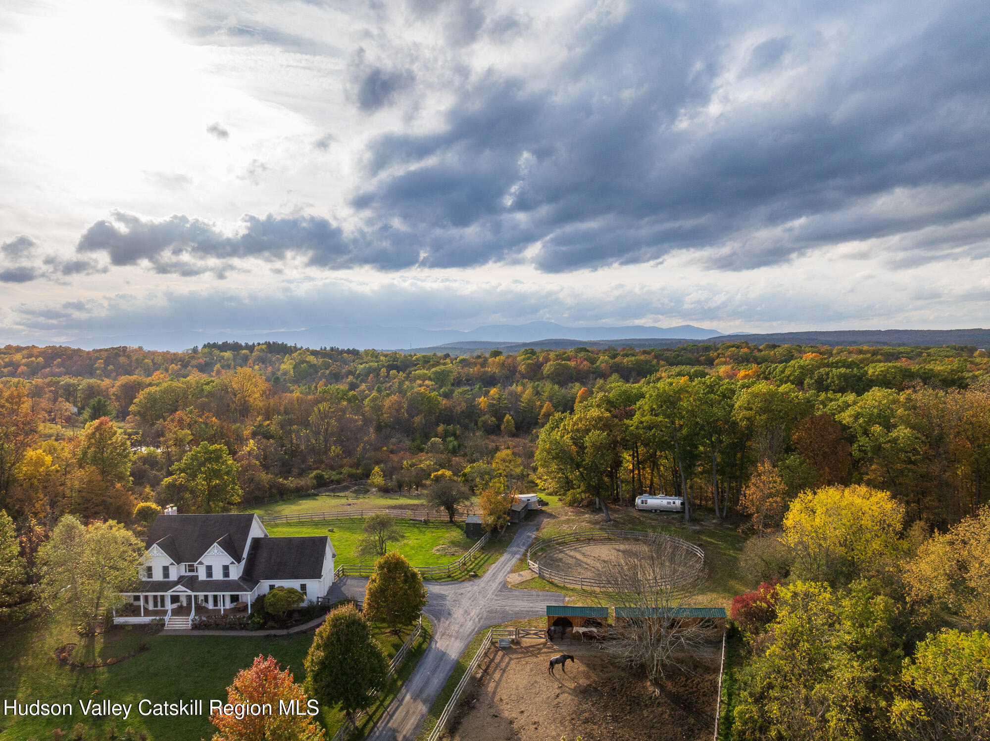 191 Farm To Market Road Athens, NY 12015 - Photo 27 of 31 a view of a lake with a mountain