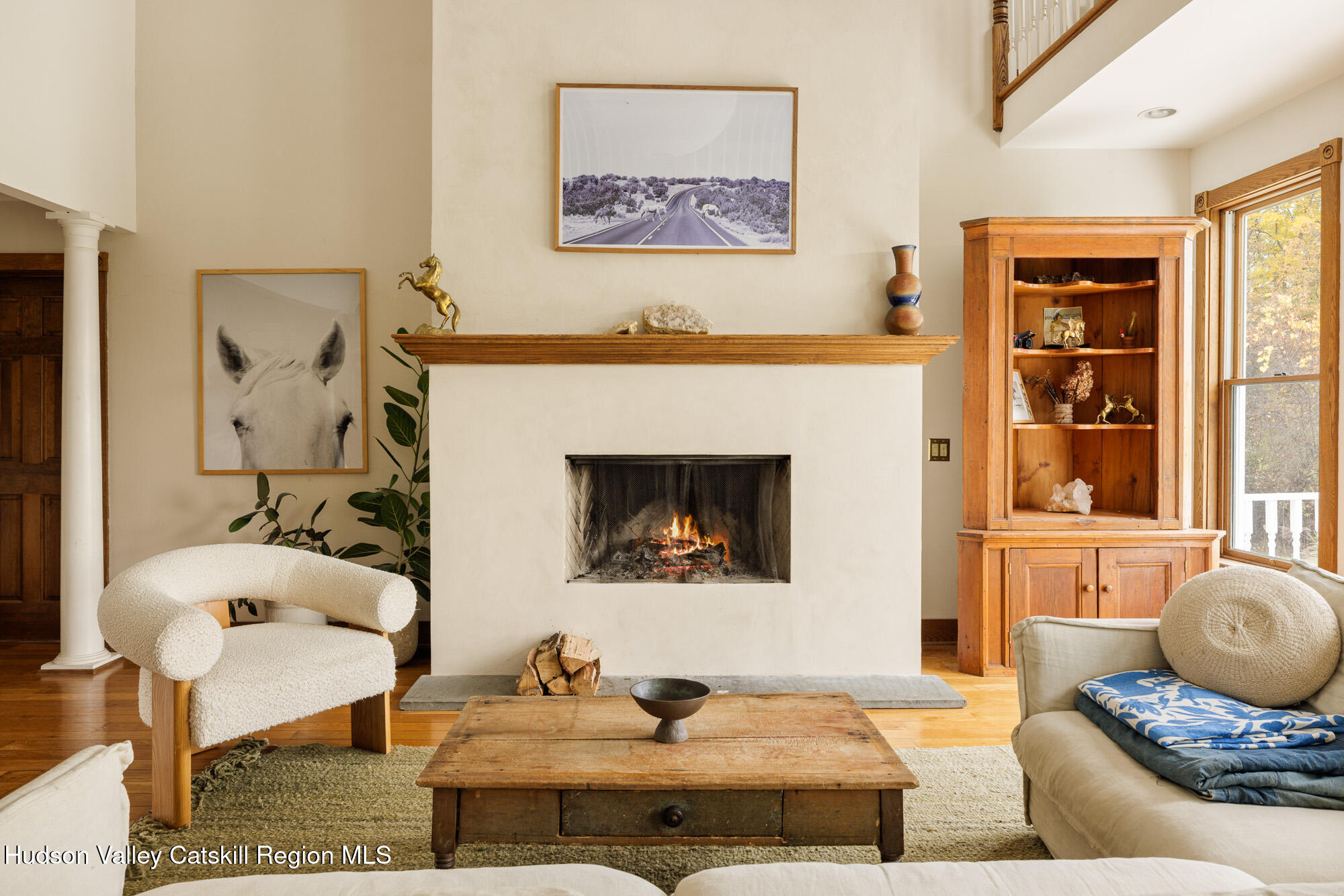 191 Farm To Market Road Athens, NY 12015 - Photo 4 of 31 a living room with furniture and a fireplace