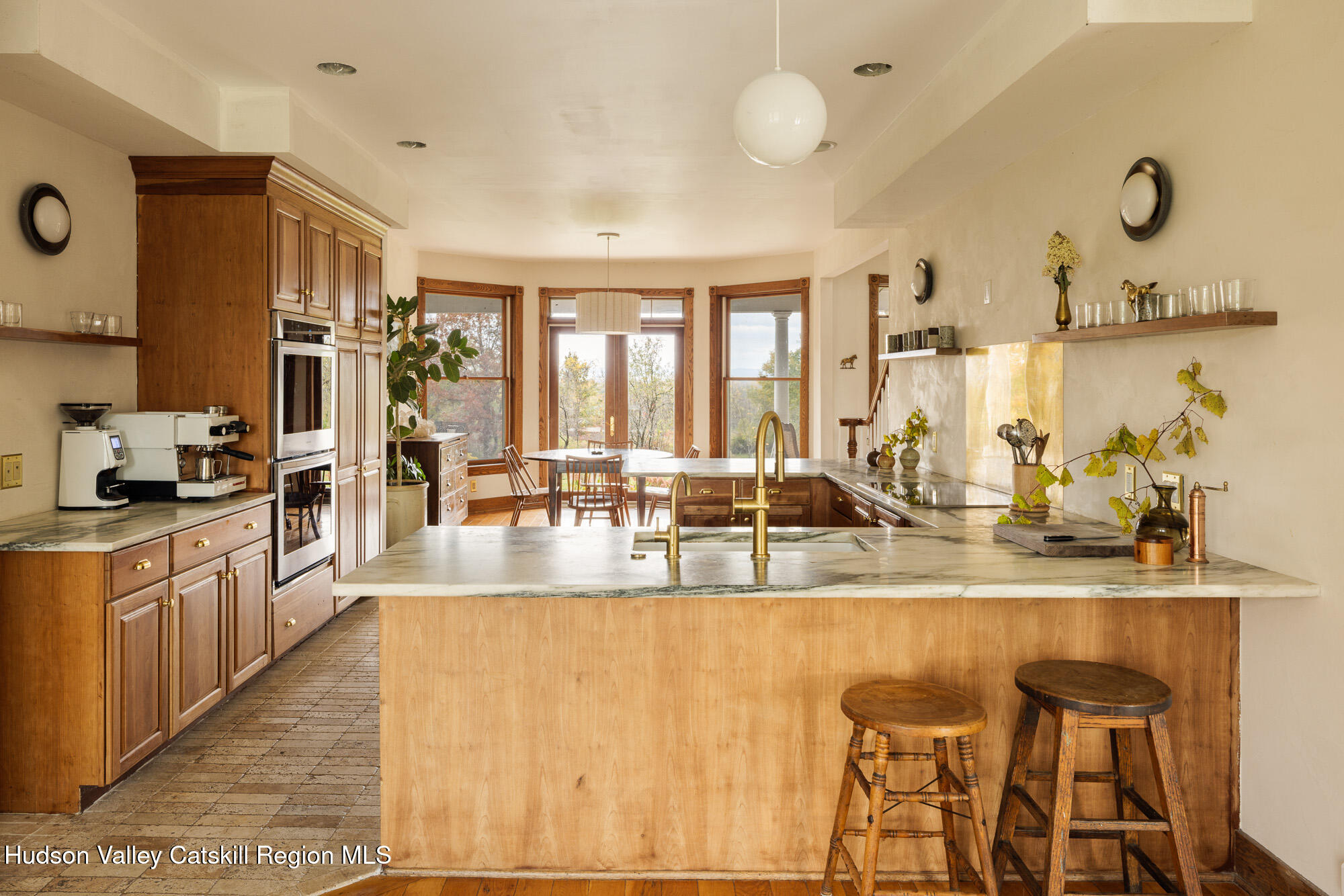 191 Farm To Market Road Athens, NY 12015 - Photo 7 of 31 a large kitchen with granite countertop a large counter top appliances and cabinets