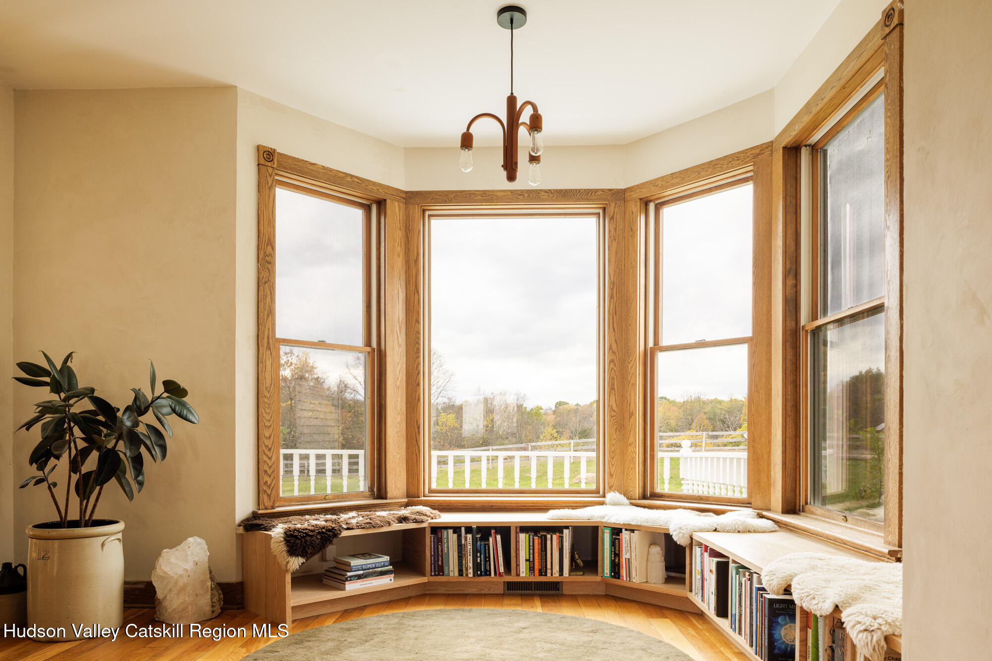 191 Farm To Market Road Athens, NY 12015 - Photo 9 of 31 a very nice looking room with a large window and a chandelier