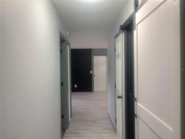 a view of a utility room with a fireplace