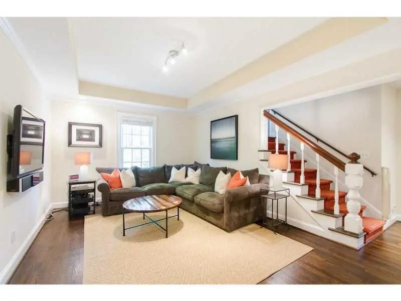 1916 Greystone Road Northwest Atlanta, GA 30318 - Photo 14 of 24 a living room with furniture and a flat screen tv