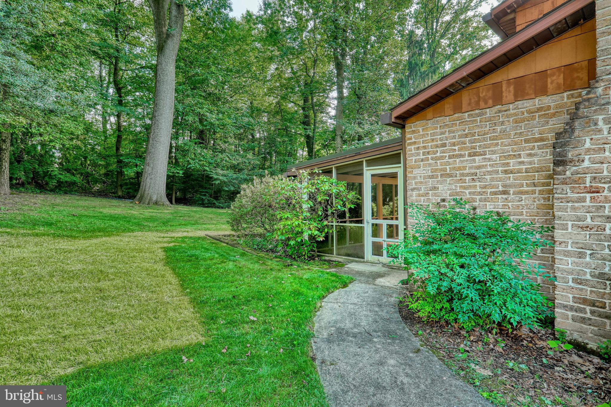 3420 Harrowgate Road York, PA 17402 - Photo 8 of 41 Side yard to enter 10 X 20 screened porch