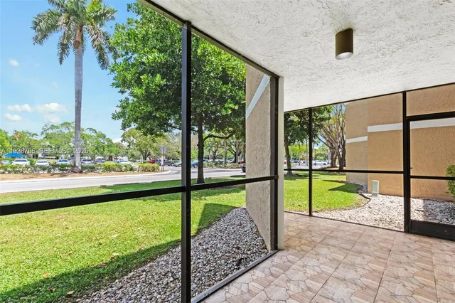 a view of swimming pool from a balcony