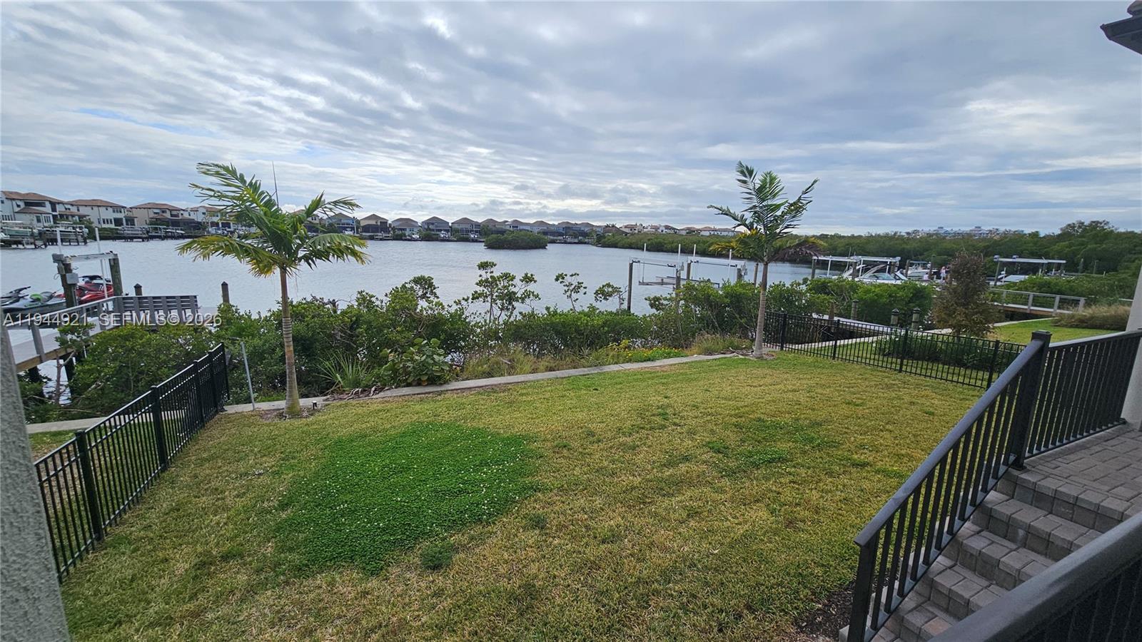 1112 Seagrape Drive Ruskin, FL 33570 - Photo 13 of 18 a view of a garden from a balcony