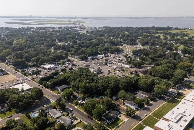 an aerial view of a city with lots of residential buildings