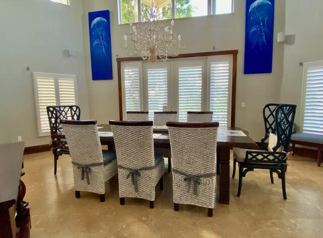 141 Canal Street Tavernier, FL 33070 - Photo 15 of 90 a dining room with furniture and windows
