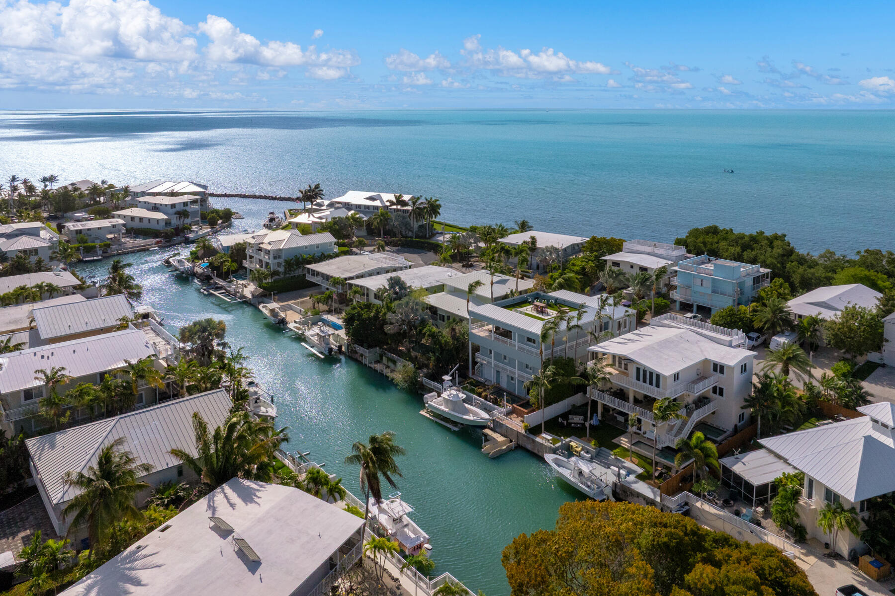 141 Canal Street Tavernier, FL 33070 - Photo 87 of 90 an aerial view of ocean and residential houses with outdoor space