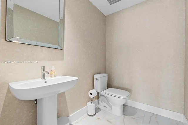 a view of a lake with couches and city view