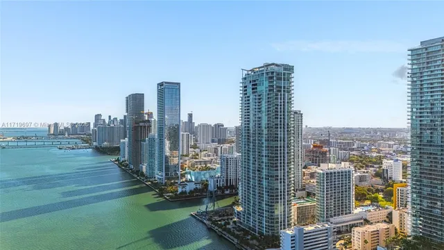 a view of a swimming pool with a yard