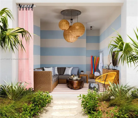 a living room with furniture and a painting on the wall