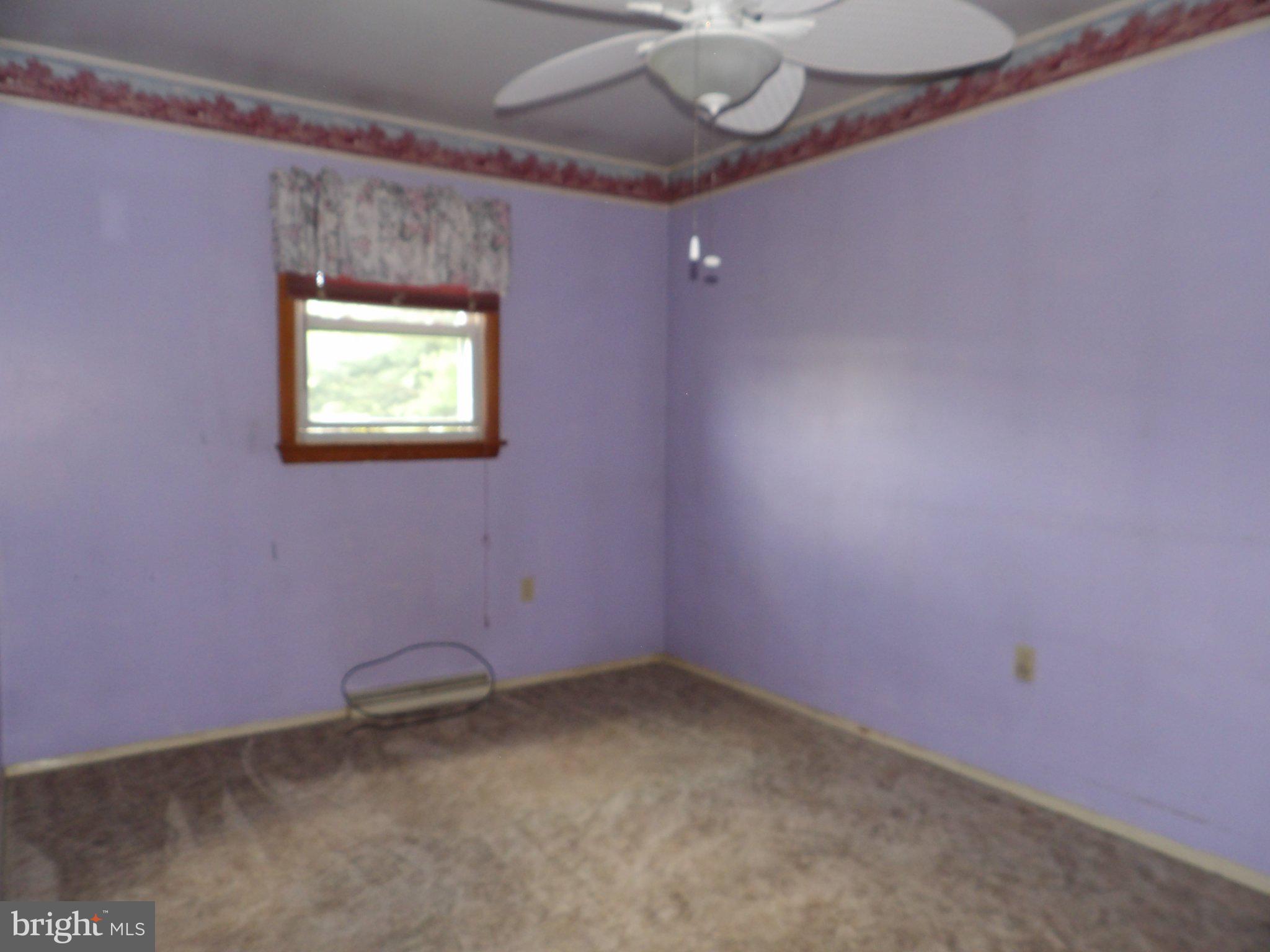 1045 Lockport Road Lewistown, PA 17044 - Photo 12 of 51 Charming pastel room with natural light.