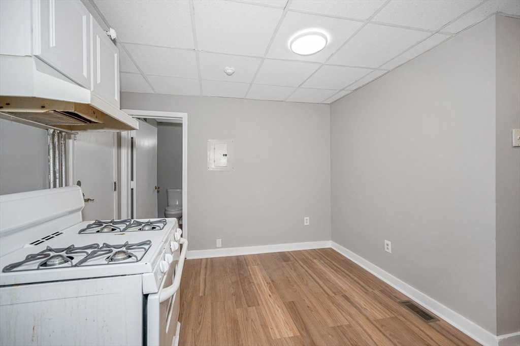 90 Appleton Street, Unit U:7 Lowell, MA 01852 - Photo 3 of 13 a bathroom with a sink and a mirror