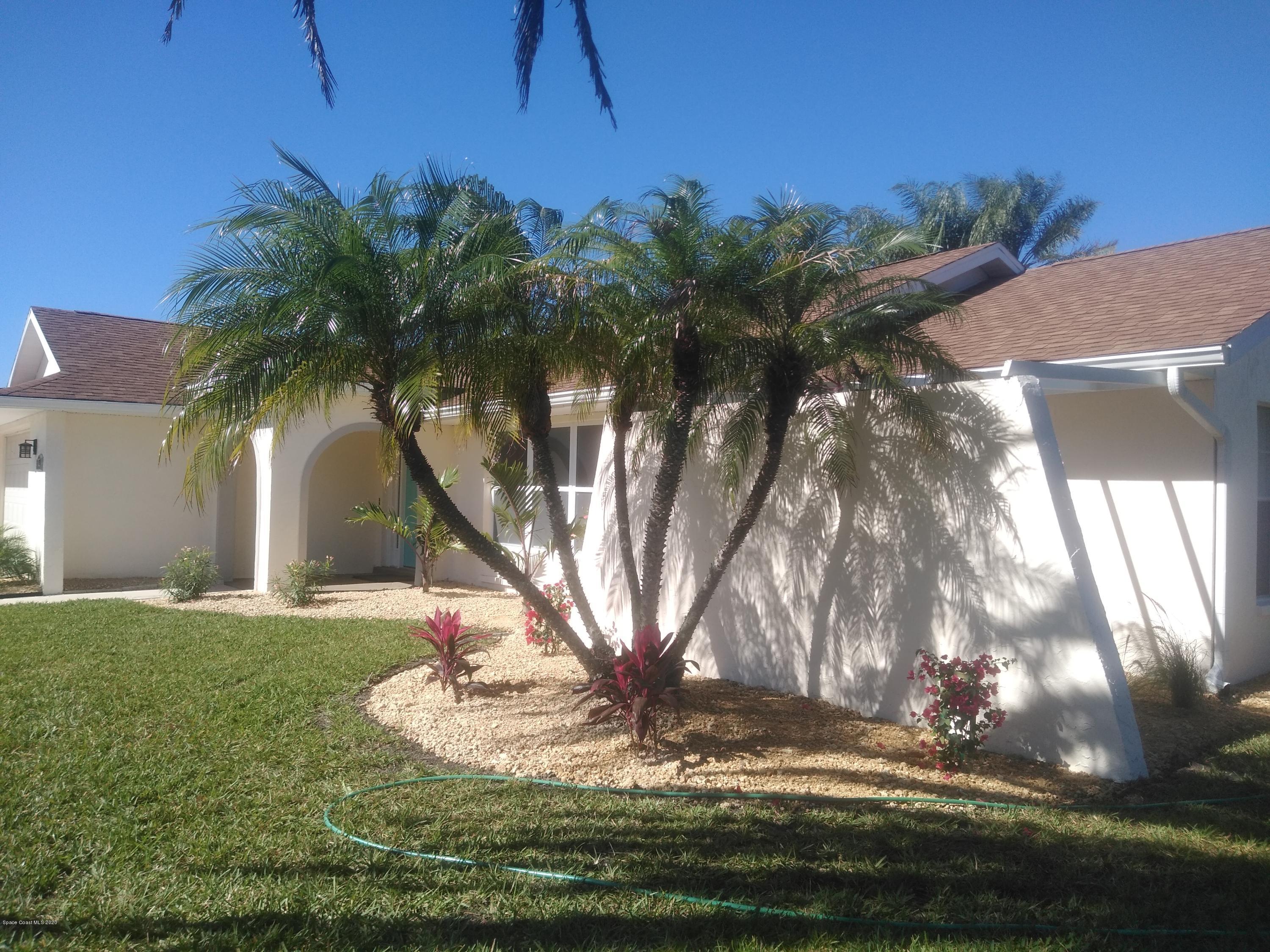 770 Montclair Road Northeast, Unit 1 Palm Bay, FL 32905 - Photo 4 of 23 a view of a yard
