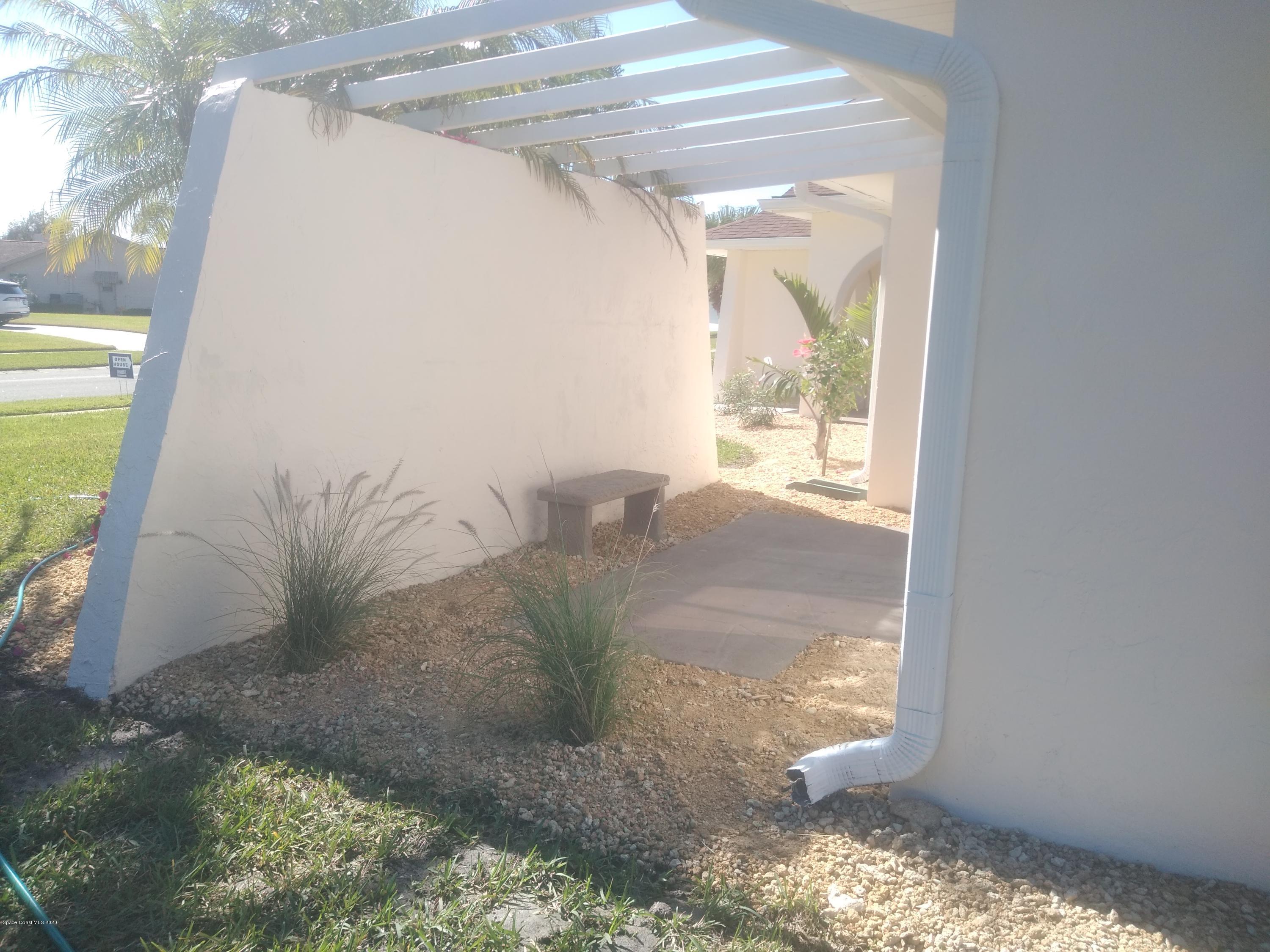 770 Montclair Road Northeast, Unit 1 Palm Bay, FL 32905 - Photo 6 of 23 a view of a porch