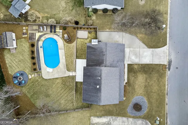 a bathroom with a sink mirror and vanity