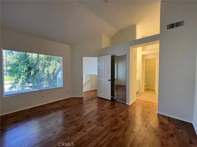 a bathroom with a double vanity sink and mirror with shower