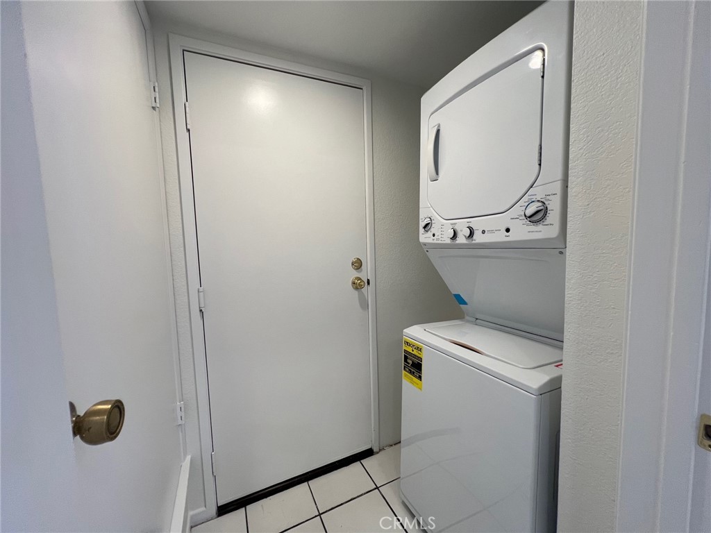 16 Key West Laguna Niguel, CA 92677 - Photo 18 of 23 a utility room with dryer and washer