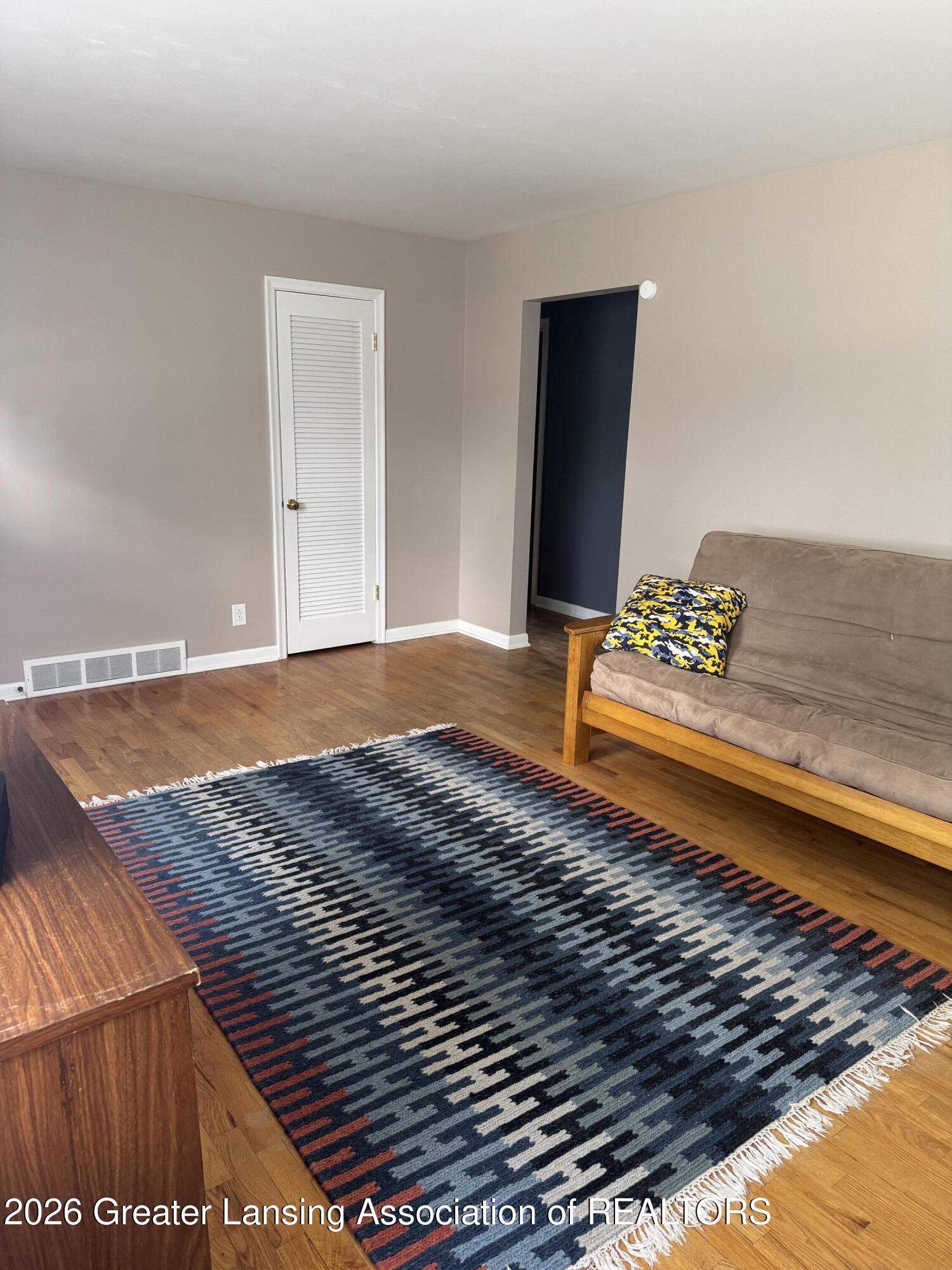 4901 Alpha Street Lansing, MI 48910 - Photo 10 of 34 Living Room 3