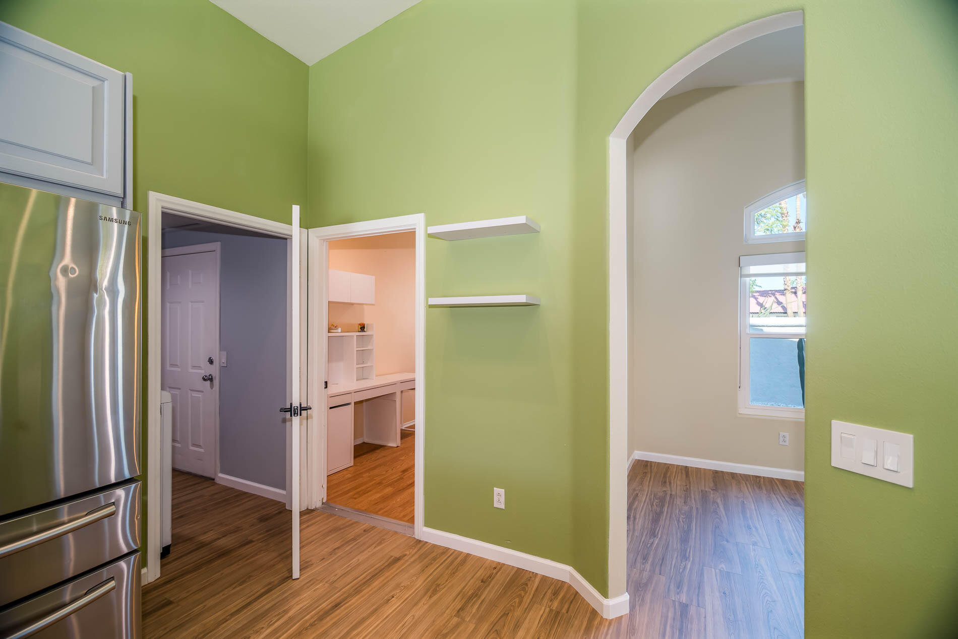 67685 Garbino Road Cathedral City, CA 92234 - Photo 32 of 45 a view of walk in closet with wooden floor