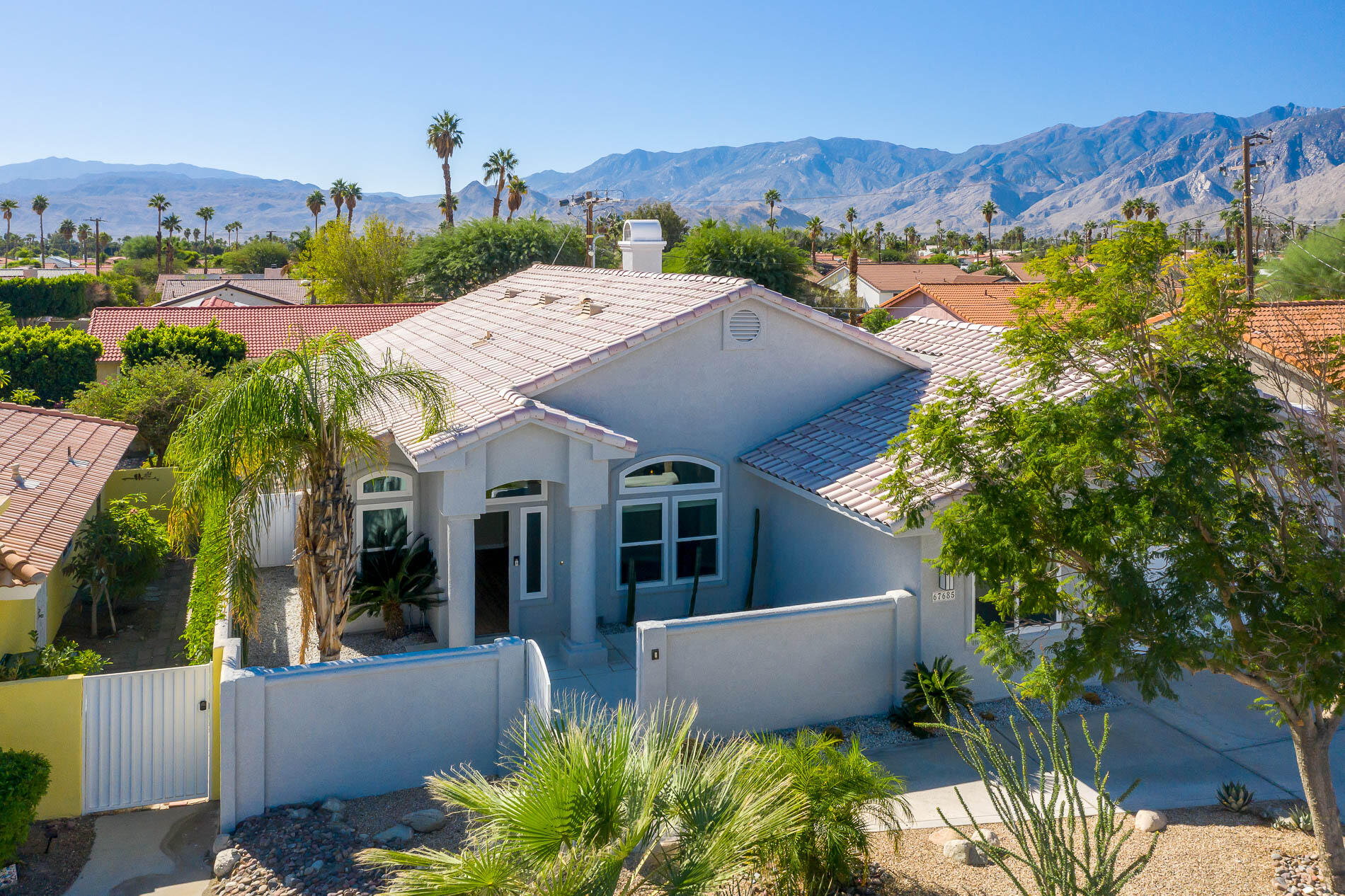 67685 Garbino Road Cathedral City, CA 92234 - Photo 43 of 45 an aerial view of a house with a yard and outdoor seating