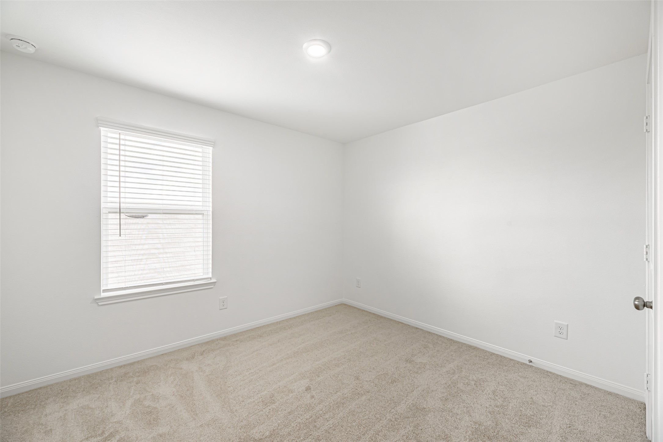 23422 Wagon Cart Road Hockley, TX 77447 - Photo 19 of 28 an empty room with a window