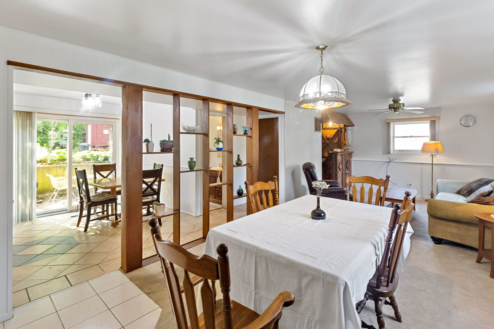 586 Raupp Boulevard Buffalo Grove, IL 60089 - Photo 5 of 26 a view of a dining room with furniture window and outside view