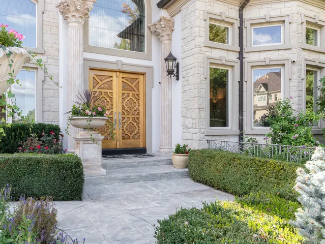 a living room with furniture a fireplace and windows