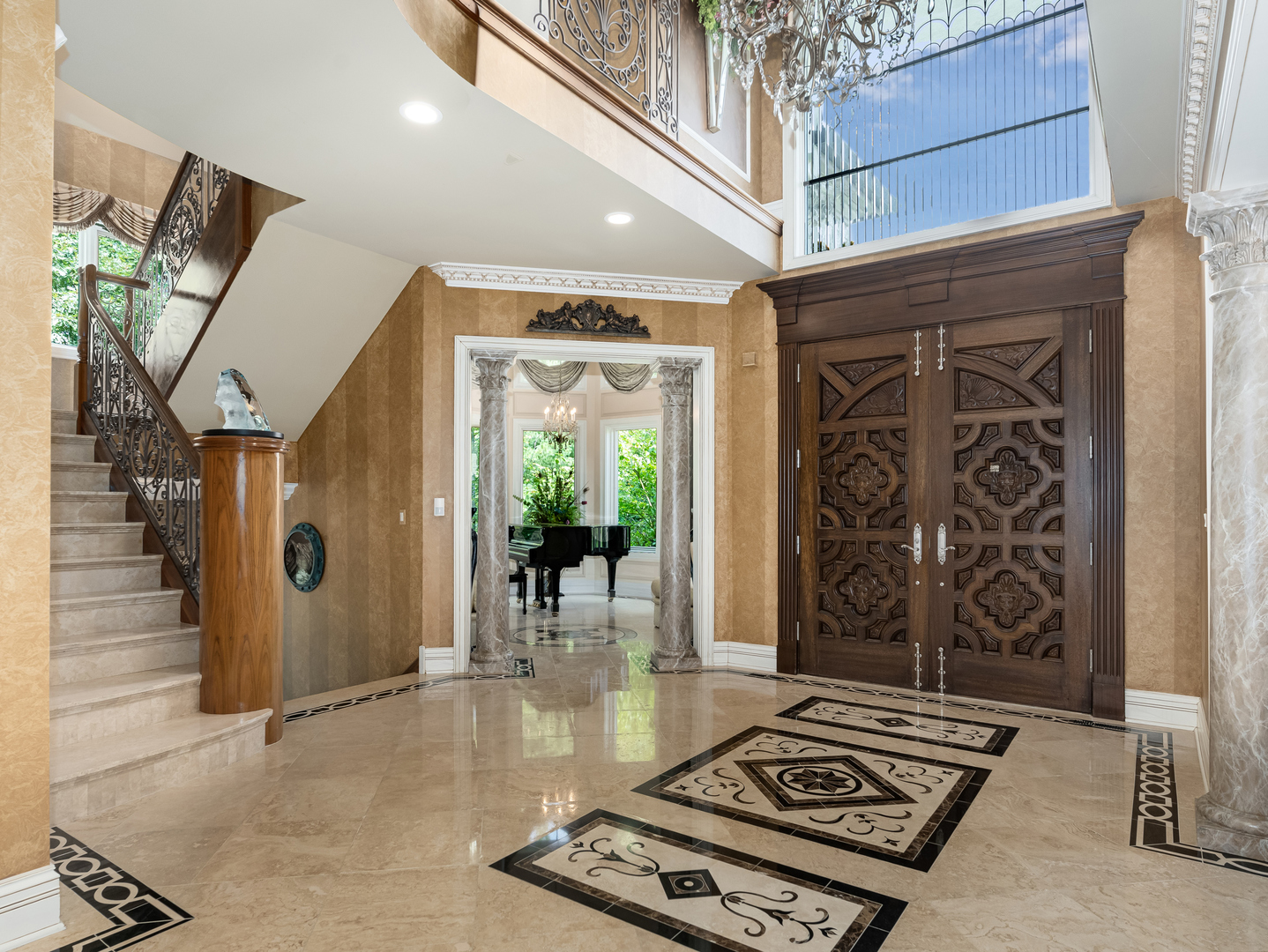 51 Ford Lane Naperville, IL 60565 - Photo 17 of 50 a view of a hallway with dining area and chandelier