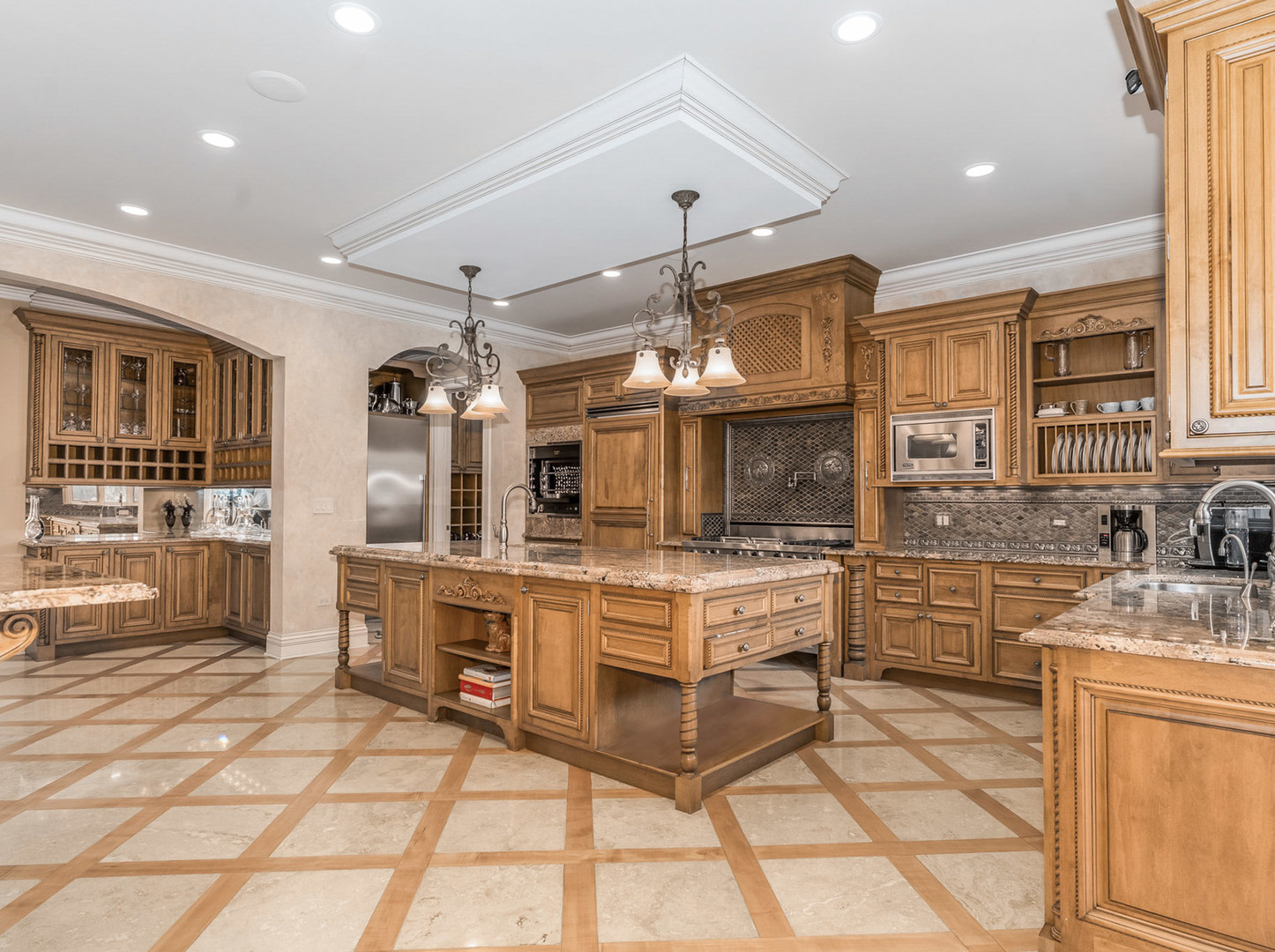 51 Ford Lane Naperville, IL 60565 - Photo 24 of 50 a large kitchen with kitchen island a sink stainless steel appliances and cabinets