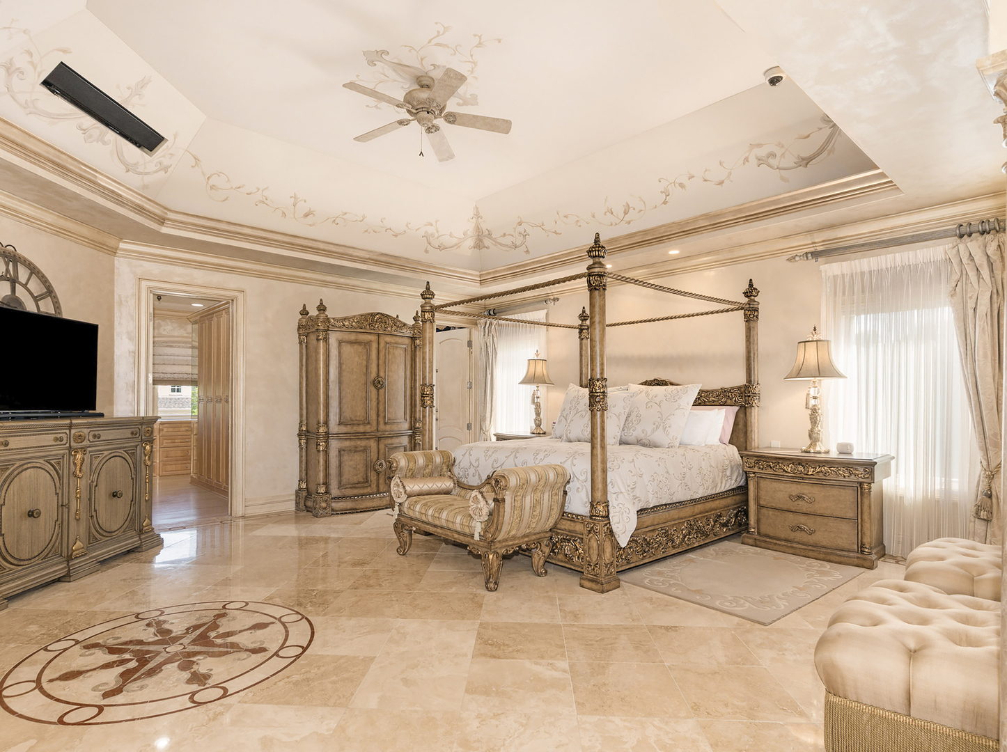 51 Ford Lane Naperville, IL 60565 - Photo 35 of 50 a spacious bedroom with a bed a couch and flat screen tv