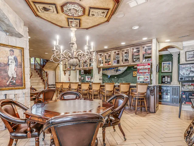 a kitchen with stainless steel appliances granite countertop a stove and cabinets
