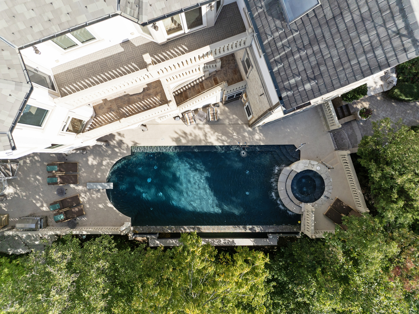 51 Ford Lane Naperville, IL 60565 - Photo 5 of 50 an aerial view of a backyard with chairs and a fire pit