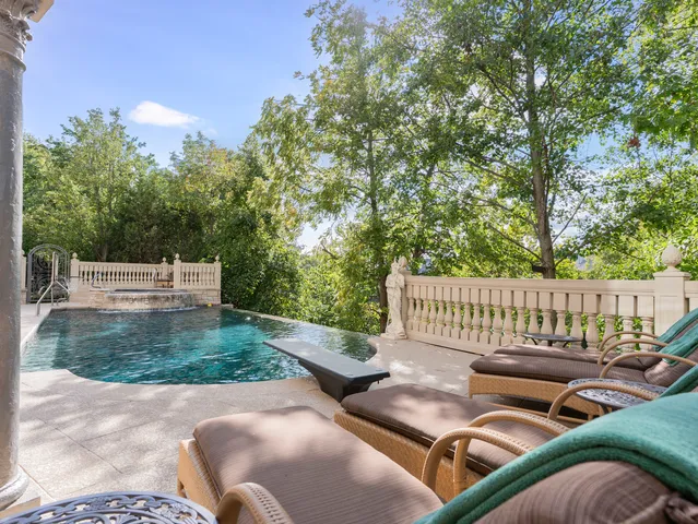 a view of a yard with couches chairs