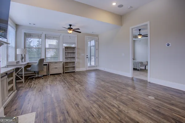 a living room with a fireplace and a table