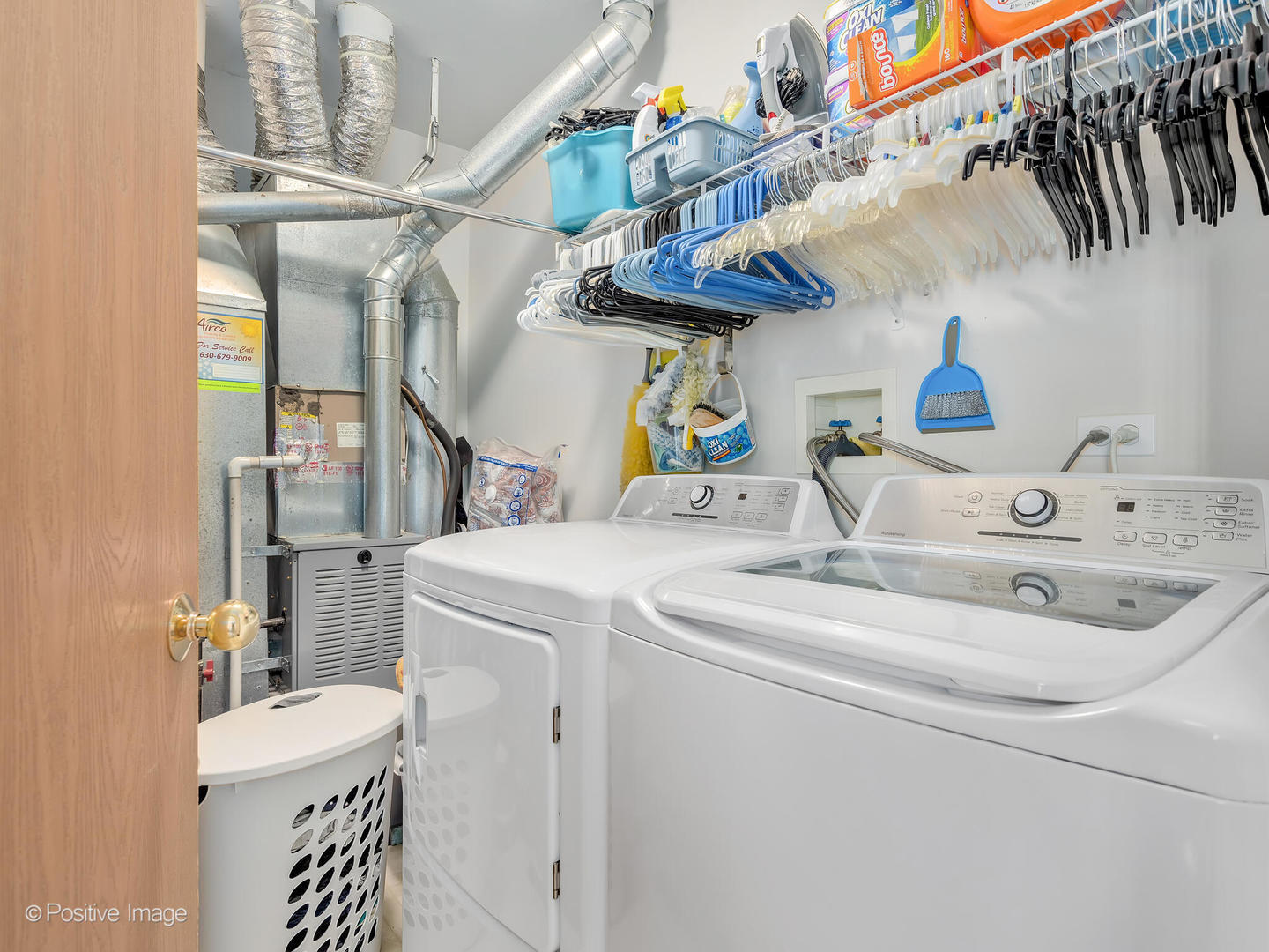 2538 Carrolwood Road Naperville, IL 60540 - Photo 15 of 16 a bathroom with a sink and a mirror