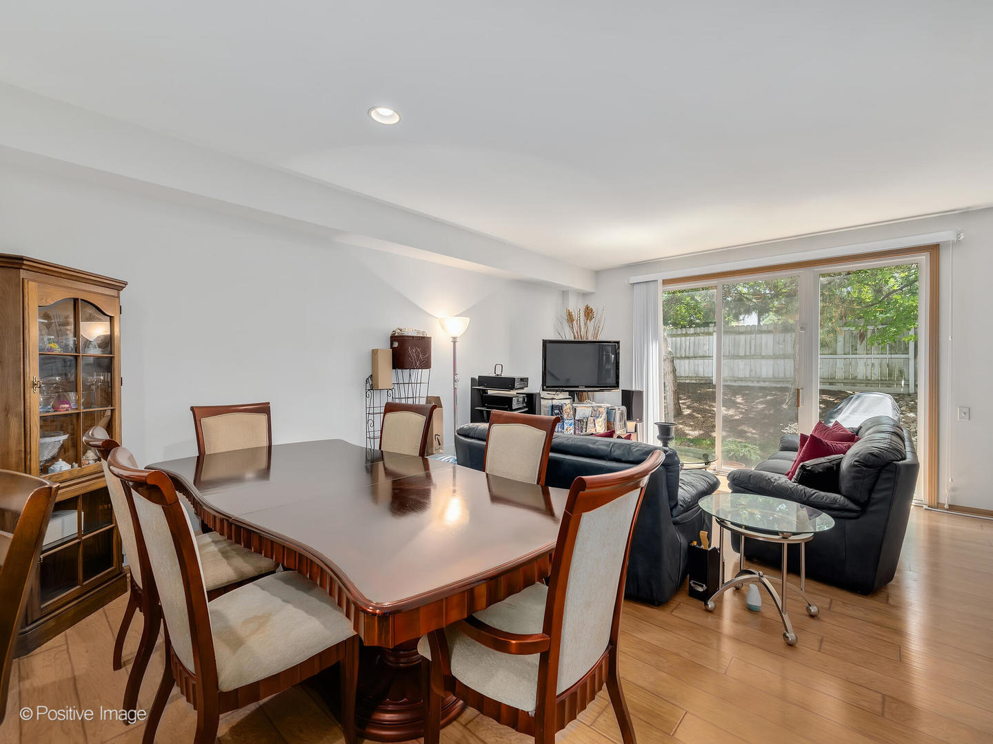 2538 Carrolwood Road Naperville, IL 60540 - Photo 3 of 16 a dining room with furniture and a floor to ceiling window