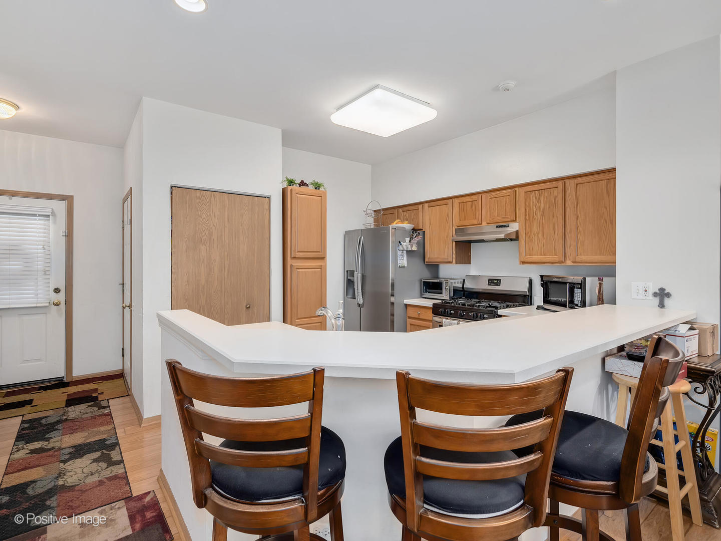 2538 Carrolwood Road Naperville, IL 60540 - Photo 7 of 16 a dining room with furniture and a window