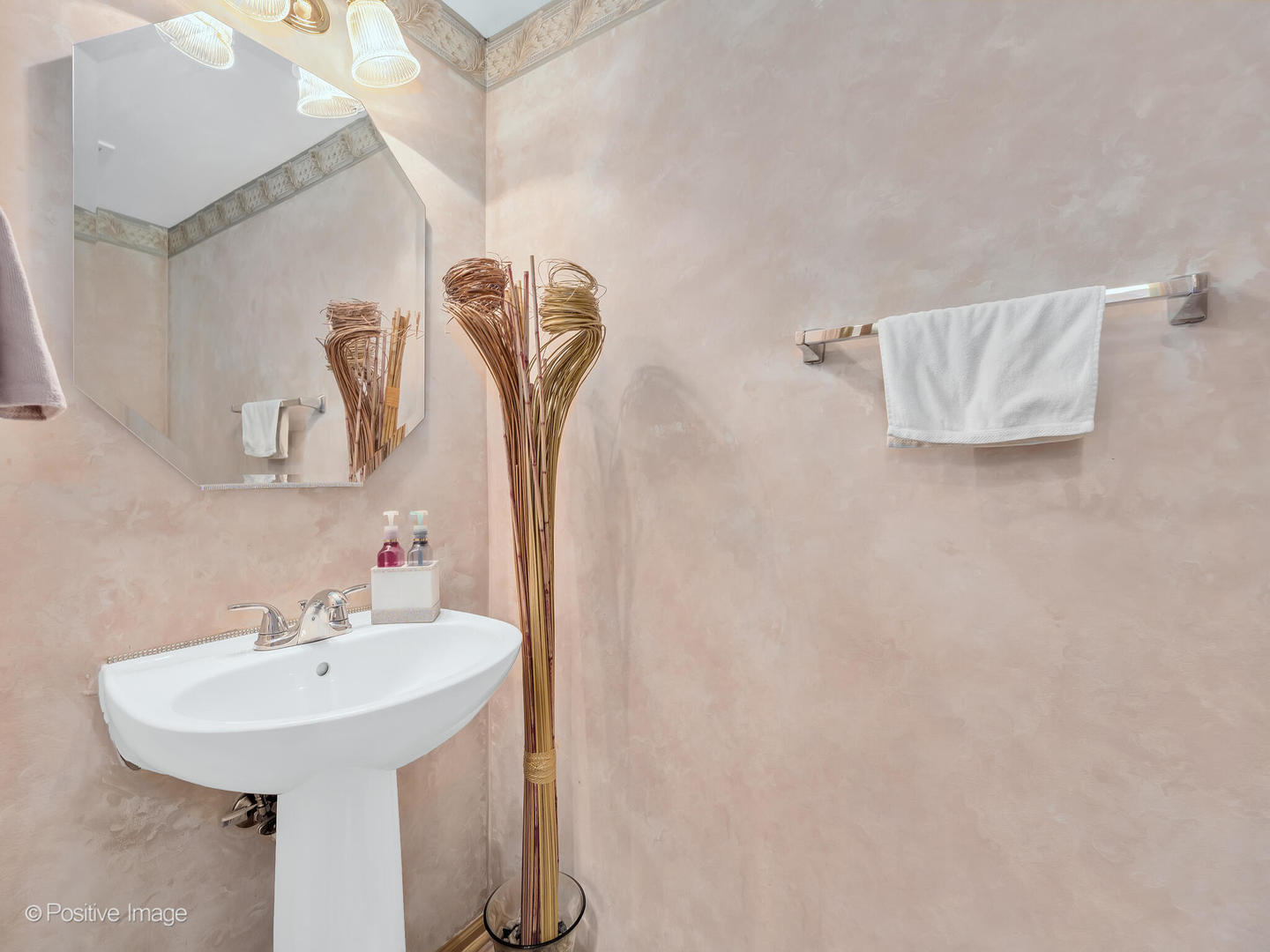 2538 Carrolwood Road Naperville, IL 60540 - Photo 9 of 16 a bathroom with a sink and a mirror