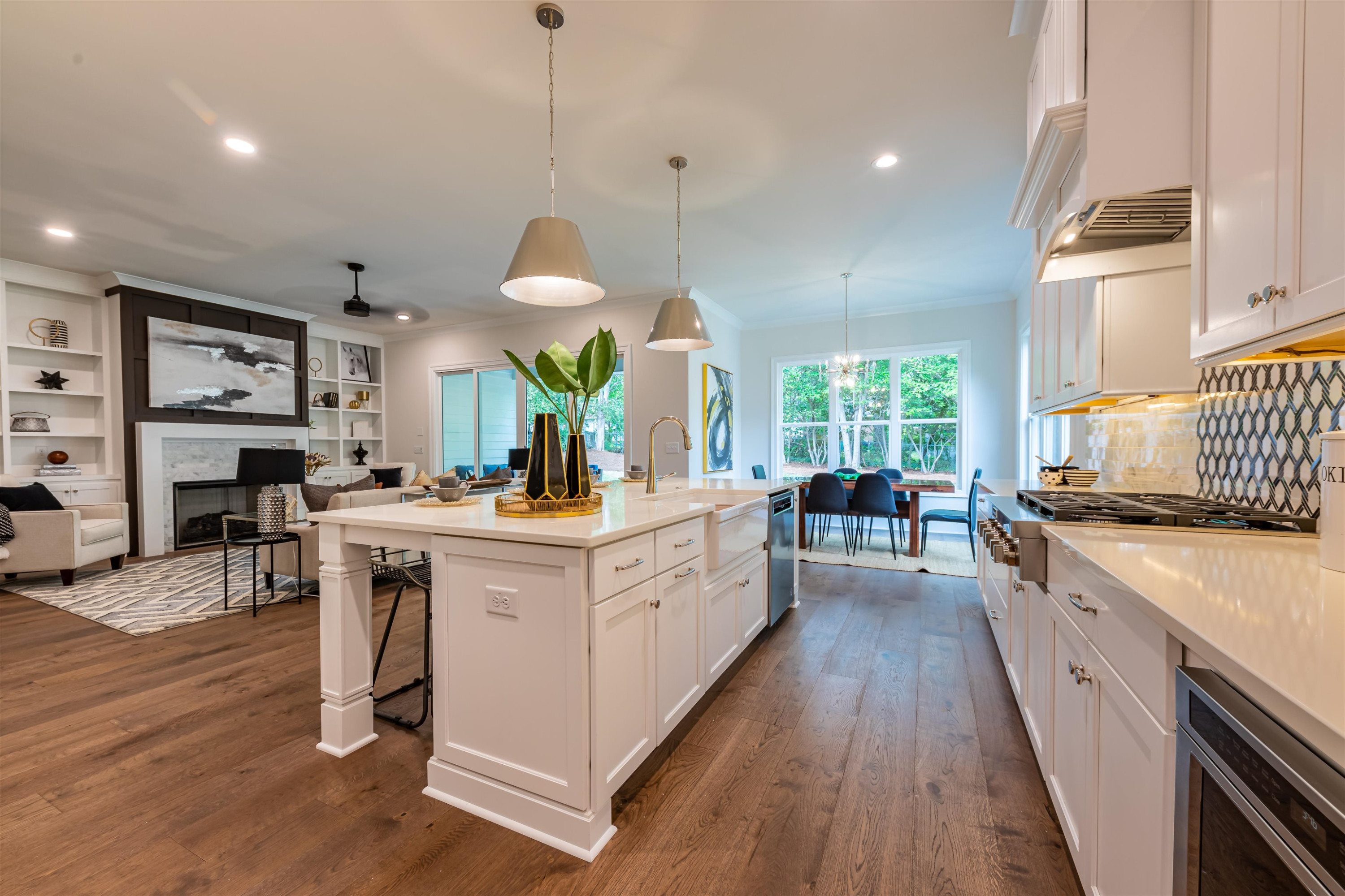 1220 Dixie Trail Raleigh, NC 27607 - Photo 14 of 40 a large white kitchen with a large window