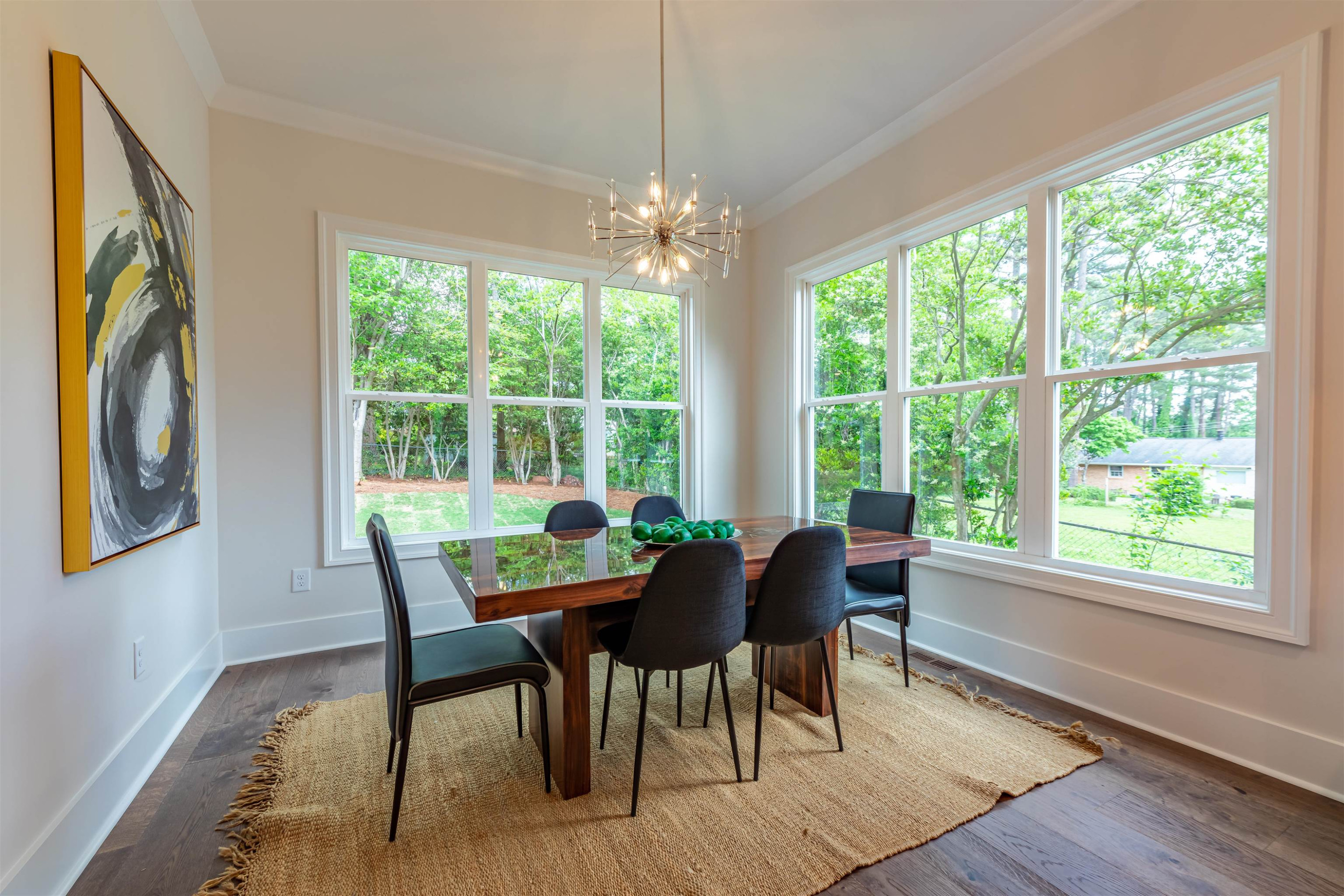 1220 Dixie Trail Raleigh, NC 27607 - Photo 15 of 40 a view of a dining room with furniture window and outside view