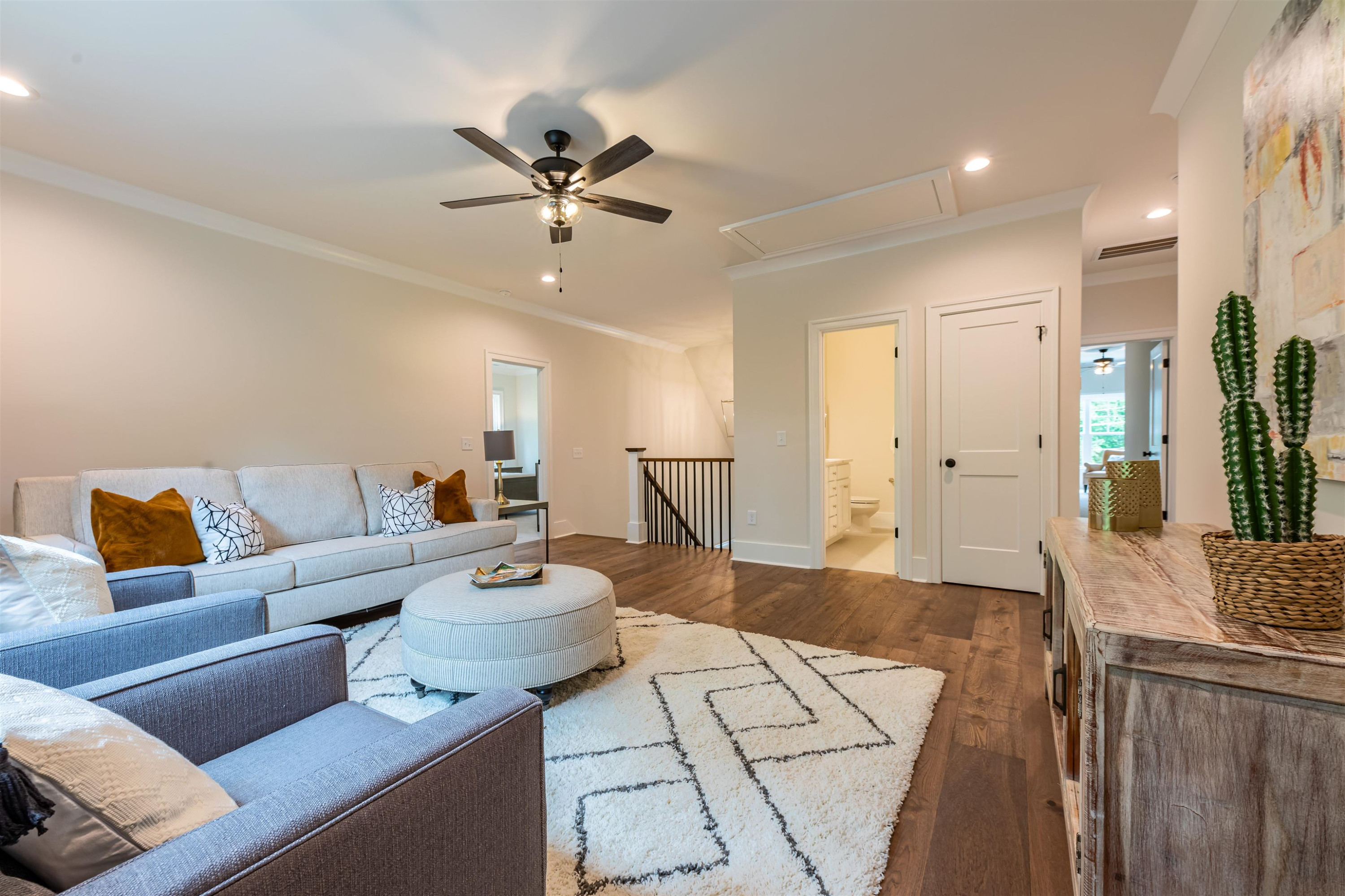 1220 Dixie Trail Raleigh, NC 27607 - Photo 26 of 40 a living room with furniture and a wooden floor