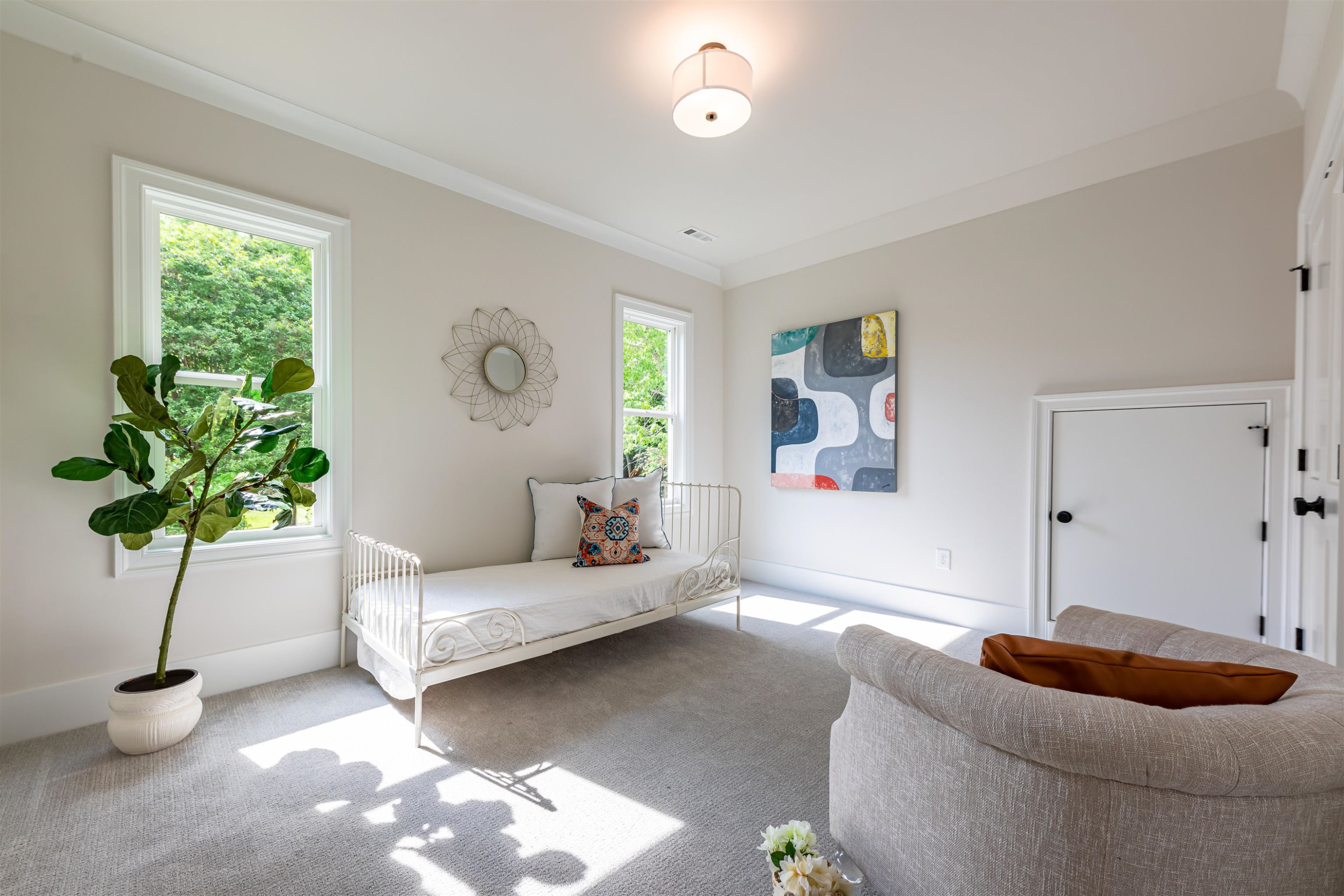 1220 Dixie Trail Raleigh, NC 27607 - Photo 28 of 40 a living room with furniture and a potted plant