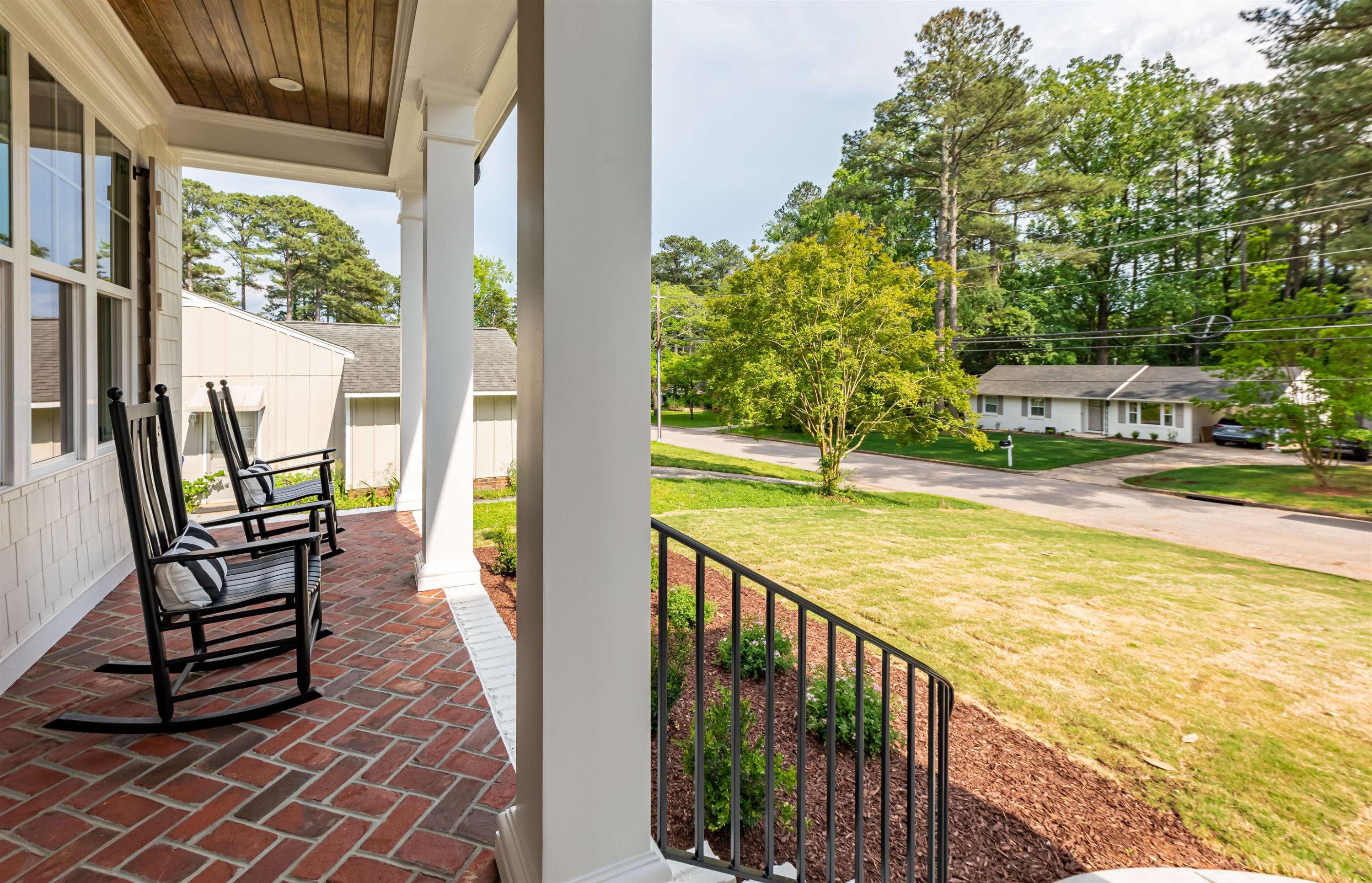 1220 Dixie Trail Raleigh, NC 27607 - Photo 3 of 40 a view of a swimming pool with a lounge chair