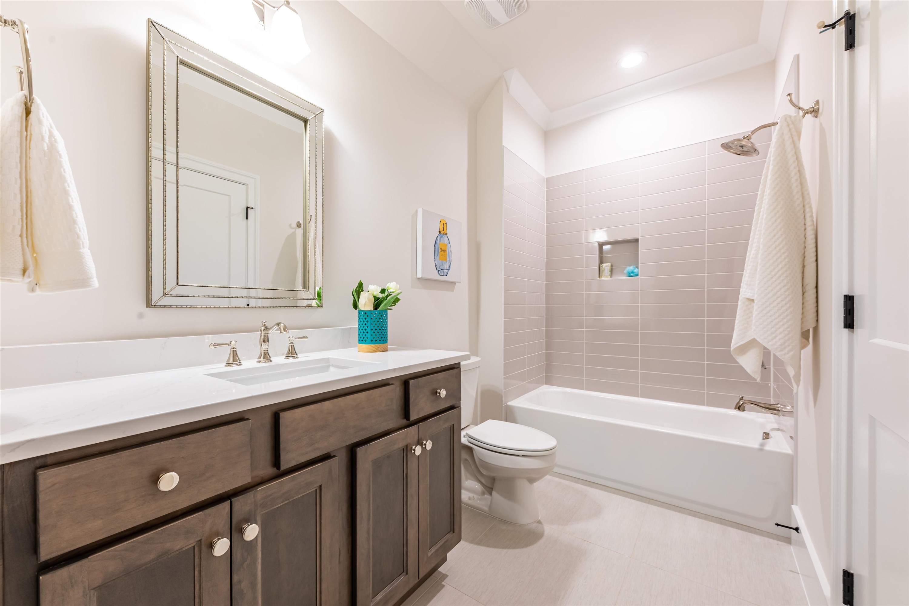 1220 Dixie Trail Raleigh, NC 27607 - Photo 35 of 40 a bathroom with a bathtub shower sink mirror and toilet