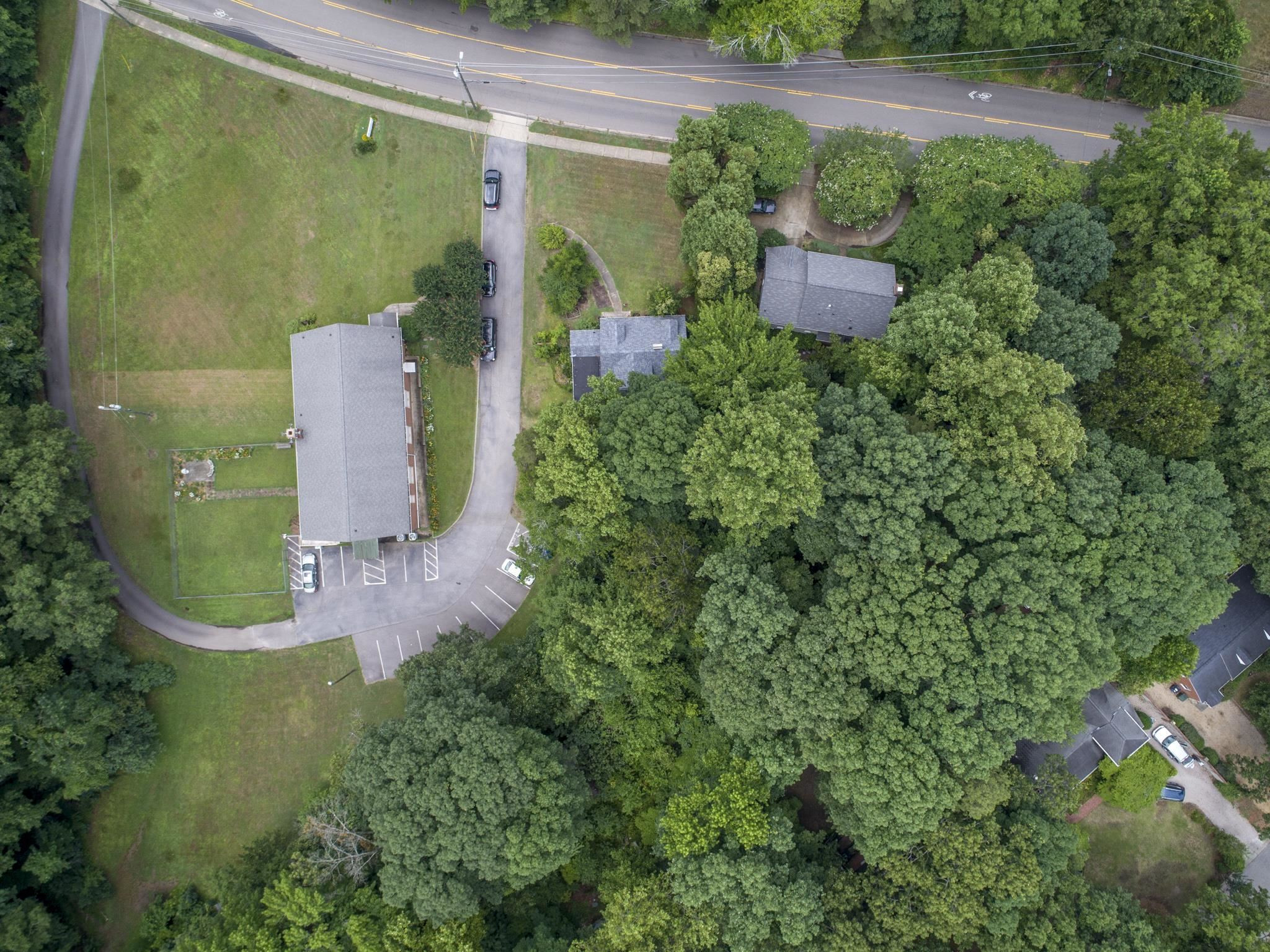 1220 Dixie Trail Raleigh, NC 27607 - Photo 37 of 40 an aerial view of a house with a yard
