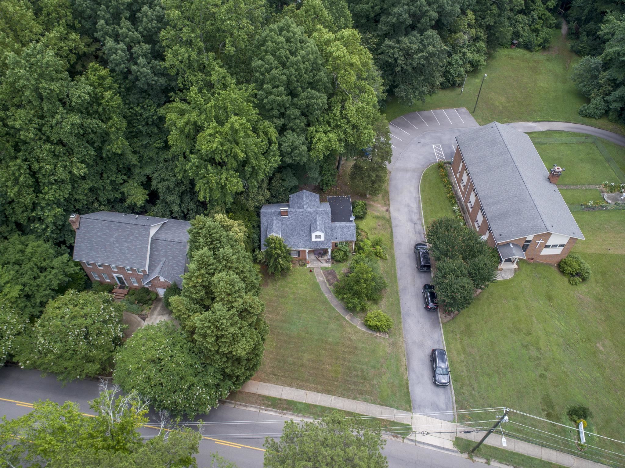 1220 Dixie Trail Raleigh, NC 27607 - Photo 40 of 40 an aerial view of a house with outdoor space and street view