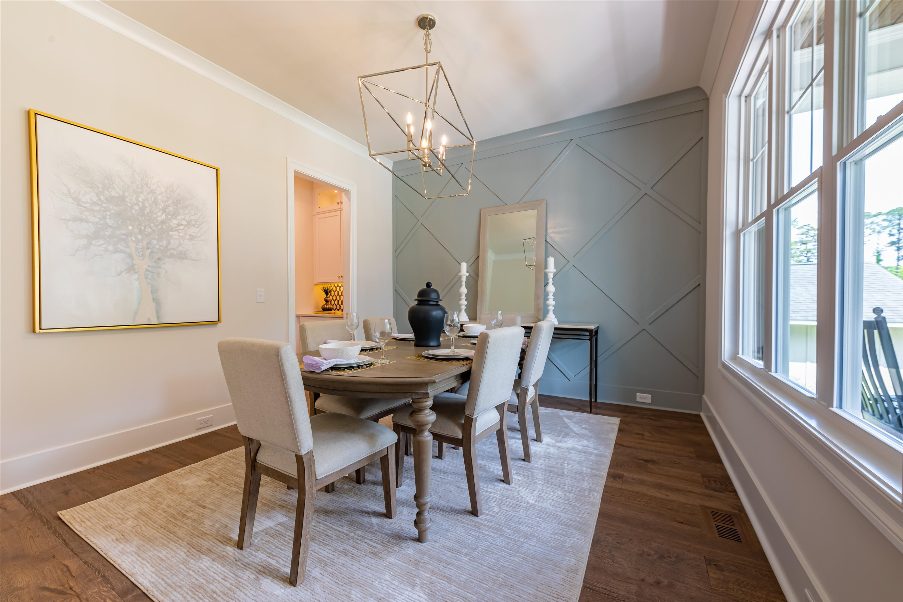 1220 Dixie Trail Raleigh, NC 27607 - Photo 6 of 40 a view of a dining room with furniture window and wooden floor