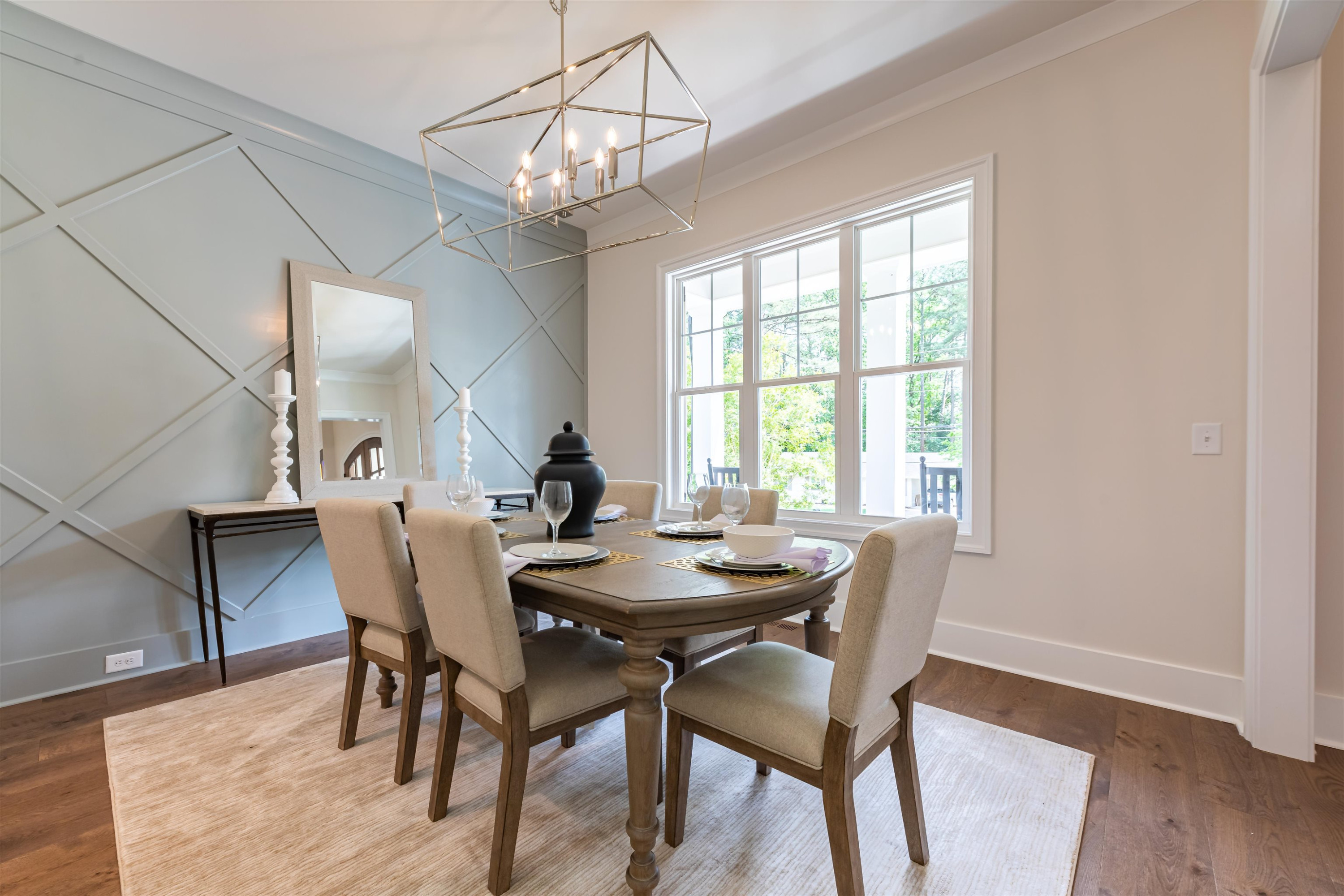 1220 Dixie Trail Raleigh, NC 27607 - Photo 7 of 40 a view of a dining room with furniture window and wooden floor