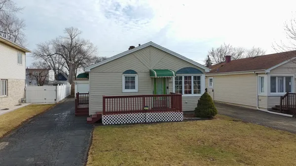 a view of a house with a roof deck